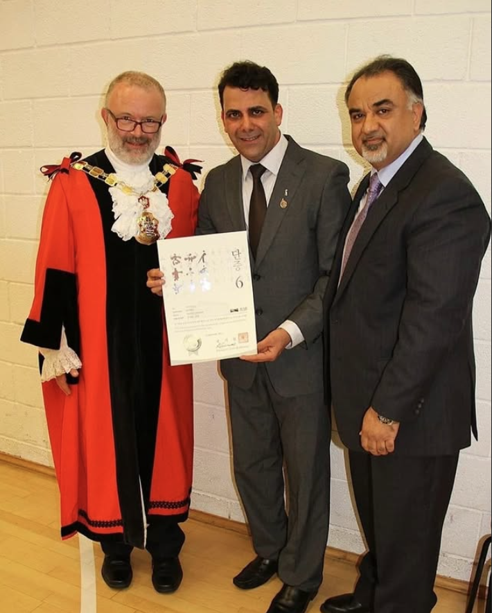 Sammy receiving an award from the Mayor of London — chiropractor at Active Care Chiropractic EC1